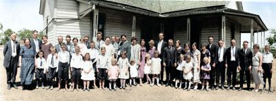 Restored and colorized (AI-assisted); faces are the original photo, colours are a best guess. Bowles family reunion, 1920s.