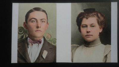 Restored and colorized (AI-assisted); faces are the original photo, colours are a best guess. J.D. Coffman and Lydia Mae Bowles Coffman, paired portraits as a young couple.