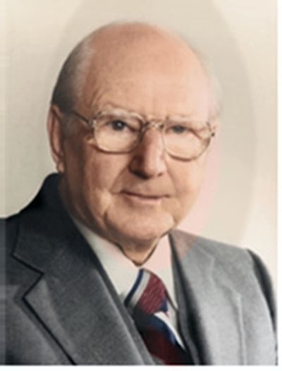 Restored and colorized (AI-assisted); faces are the original photo, colours are a best guess. James Burton Coffman, formal portrait, late life.