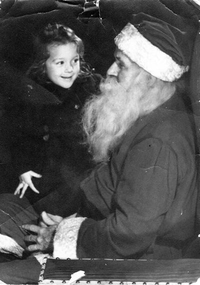 Nancy Coffman as a small girl, with Santa Claus, c. 1947