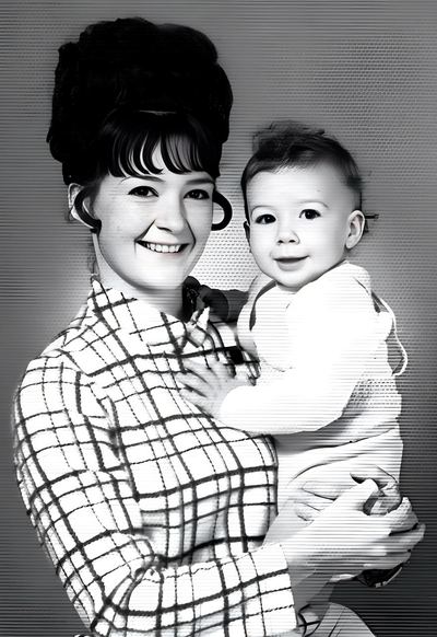 Nancy Proeger holding her infant son Earl, c. 1967