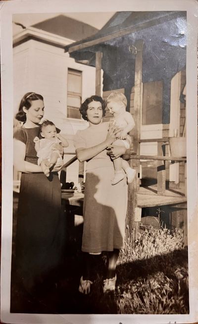Mable (Dubuque) Proeger holding Nancy, and Aileane Silva holding Dickie, c. summer 1937 — photograph courtesy of Sheryl (cousin) · Sheryl: "grandma holding little [Dickie] … and Mable holding mom"; the family called Richard Jr. "little Dickie"