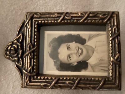 The same portrait, in its frame — Nancy, or Aileane? (identification unsettled)