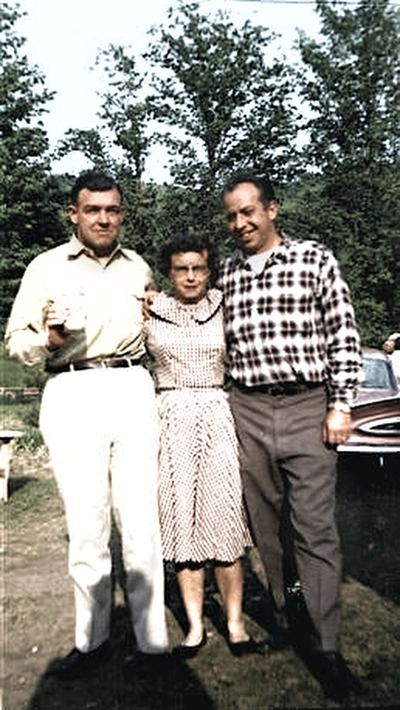Restored and colorized (AI-assisted); faces are the original photo, colours are a best guess. Earl T. Roberts — c. 1950s.