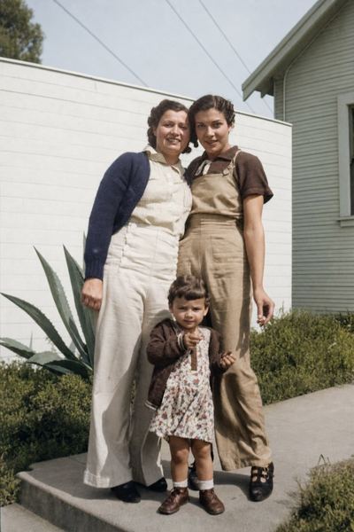 Restored with AI from the original. Three generations: Mildred Rose Silva (left), her daughter Aileane Silva Proeger (right) and granddaughter Nancy Proeger (front).
