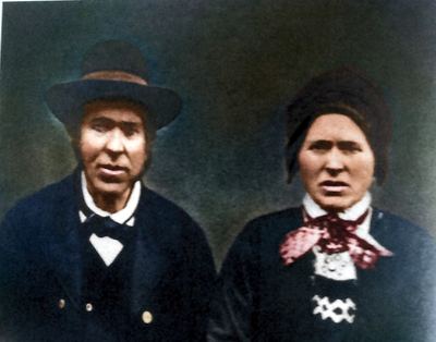 Restored and colorized (AI-assisted) — Thore Thoresen Selland and his wife (couple portrait)