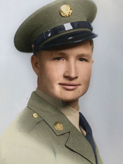Restored and colorized (AI-assisted); faces are the original photo, colours are a best guess. Clarence Melvin Walker in US Army uniform, undated.